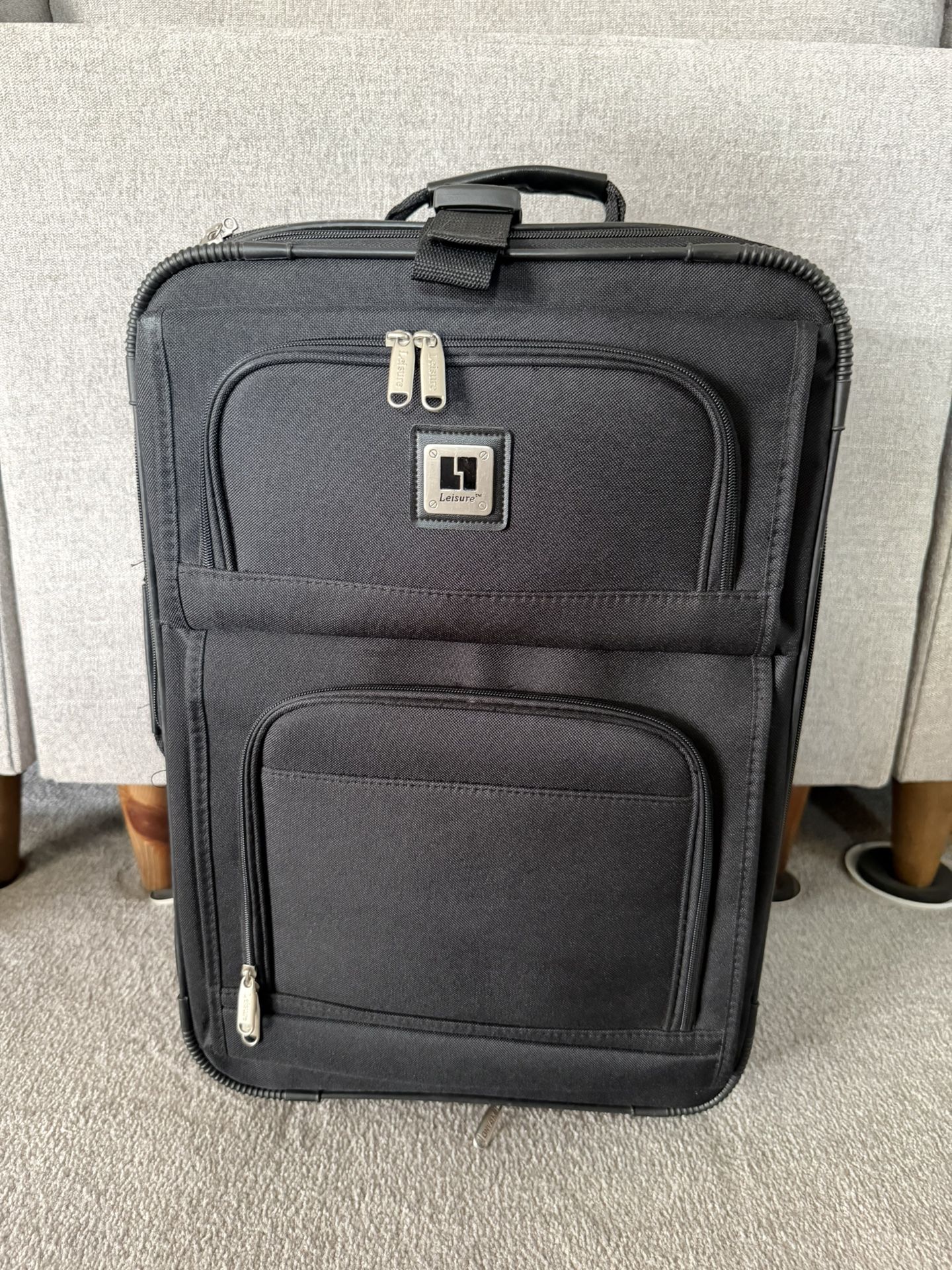 Leisure Carry-On Rolling Suitcase – Excellent Condition