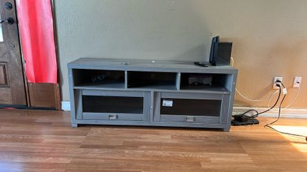 Tv stand up to 70”