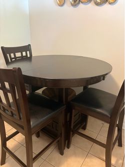 Counter height dining table