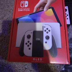 oled switch used once or 2wice literally new not a scratch on anything full docking station  