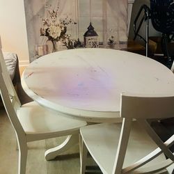 Solid white table w/ 4 chairs & large beach theme canvas