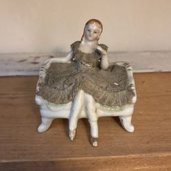 Lady and chair ceramic and fabric miniature