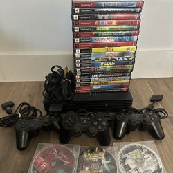 PlayStation 2 with 22 games and 3 controllers