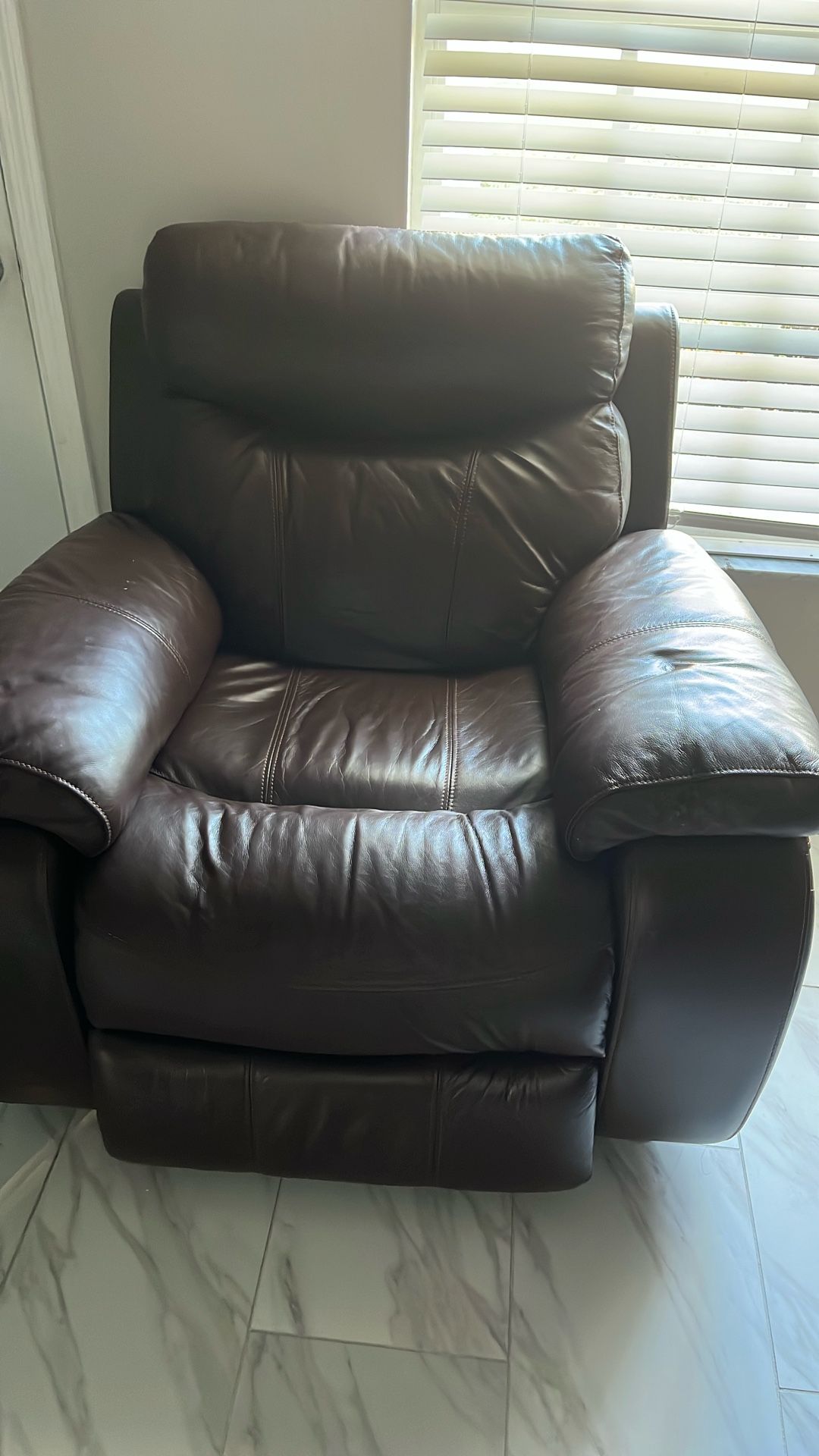 dark brown leather recliner chair