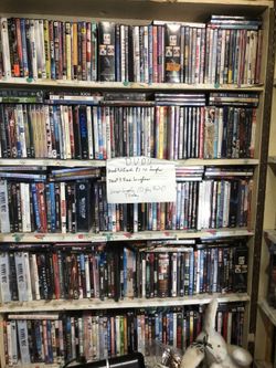 100 DVD’s different titles no certain titles