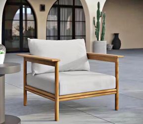 New Modway teak armchair . This outdoor chair has a natural wood frame and is model EEI-7007-NAT-SAI. Estimated (WxDxH): 37 x 35 x 25 in  Note:- missi