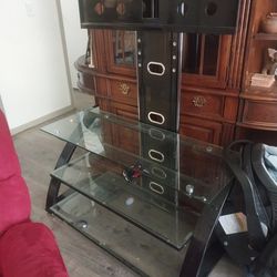 Glass shelved TV stand.