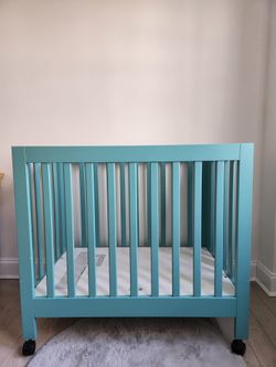 Babyletto folding mini crib Lagoon Green for Sale in Queens NY