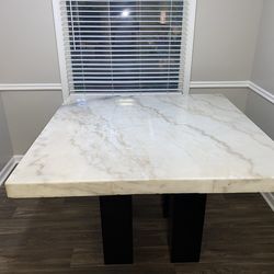 Marble table and Gray sectional Used but Fair