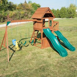 Wood Backyard Swing Set with Two Wave Slides, Wood Roof, Monkey Bars, Rock Wall, Music Play, and Swings New In Box 