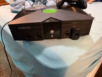 Original Xbox comes with power cord and game