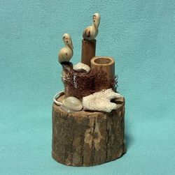 Vintage beach coastal themed figurine pelicans on dock pilings wood seashells