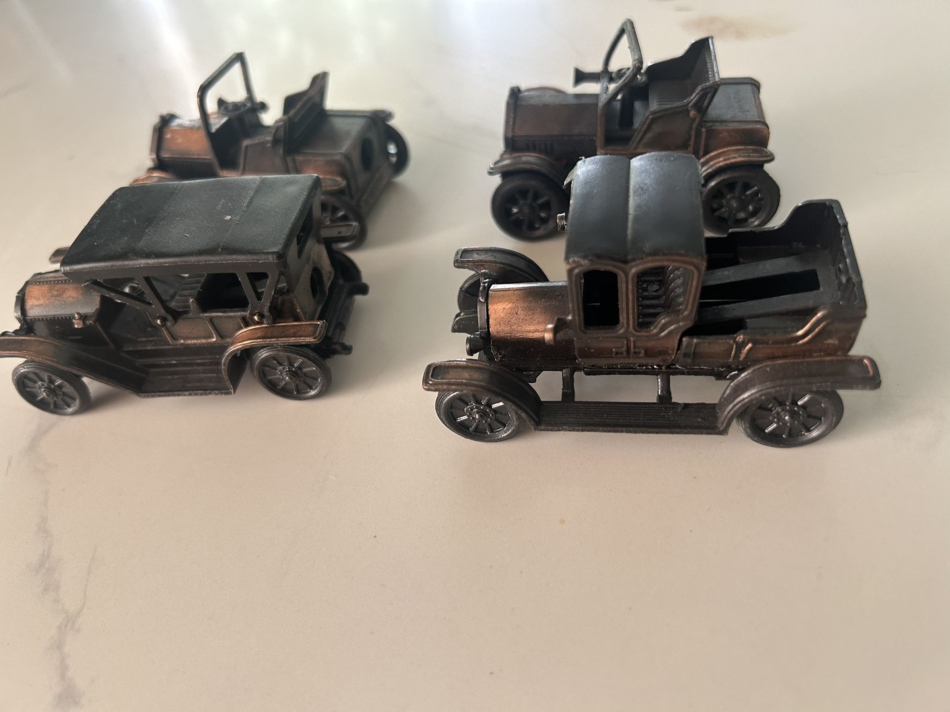 4 Little Metal Cars all For 25