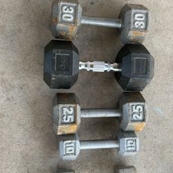 107 Pounds Total Weight 2 30’s 1 25 1 12 And 1 10 Pound Weight 