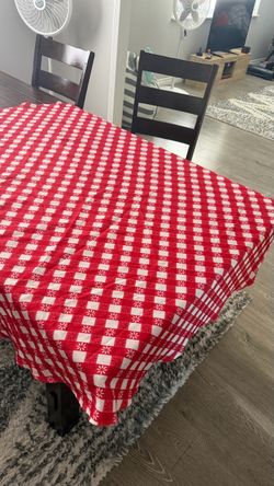 Red and white checkered with flowers fabric tablecloths round approximately 68” 2 pcs