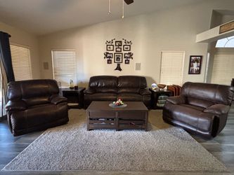 Recliner couch and chairs.