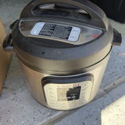NEW Never Used Instant Pot DUO60 6-Qt 7-in-1 Electric Pressure Cooker