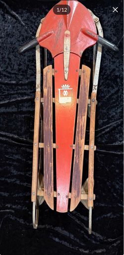 vintage 1940s or 1950s Red Rocket wooden and metal sled rustic interior design