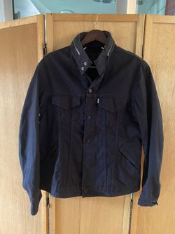 Levi’s black canvas/denim jacket (men’s large)