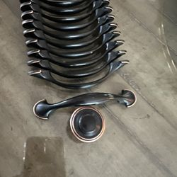 Bronze.Cabinet Handles and knobs $80 all 