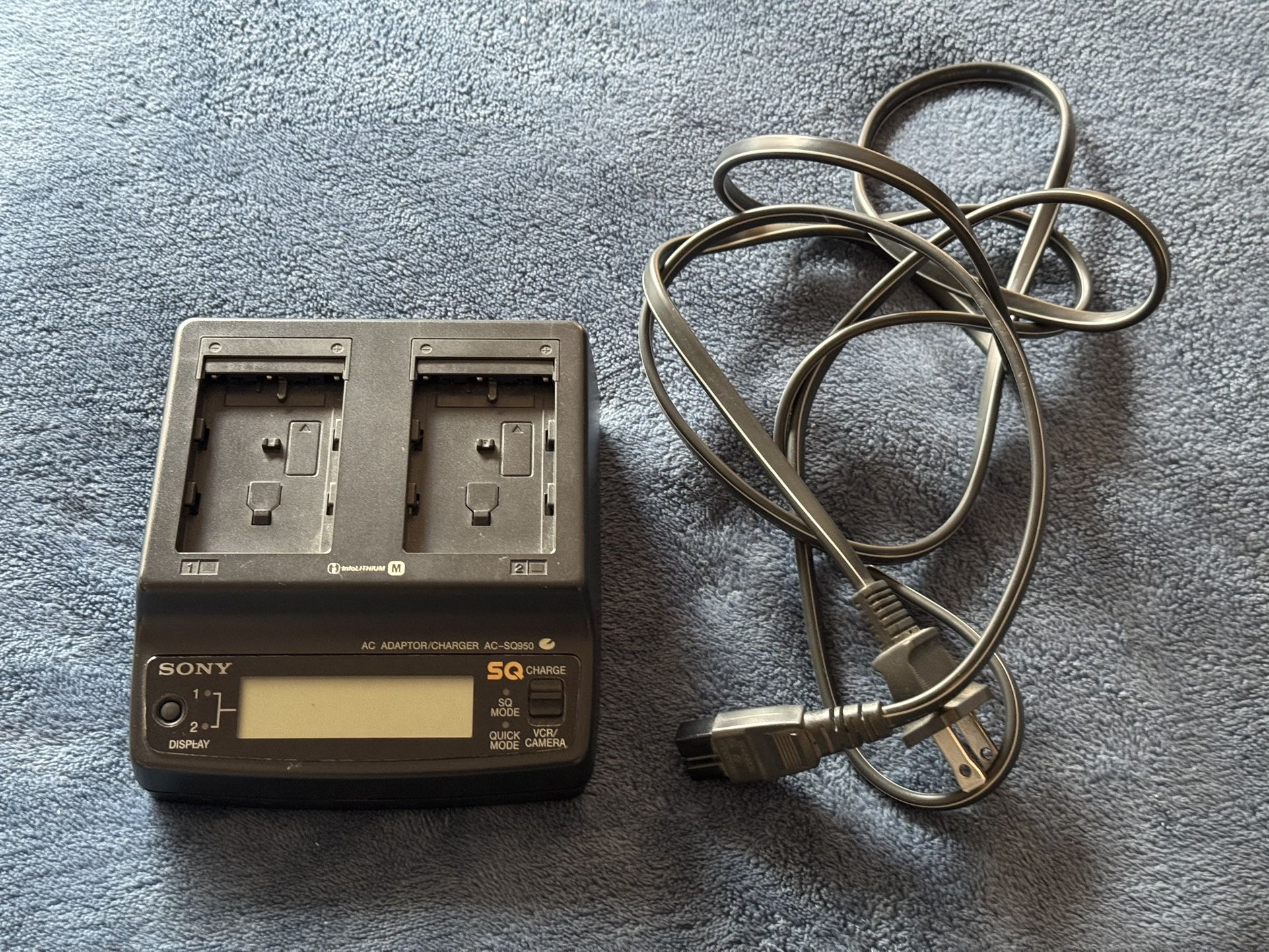 Sony ACSQ950D AC/DC adapter charger for Sony Alpha DSLR cameras and MiniDV camcorders