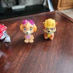 15 paw patrol, Character in a car, 14 are figures. Sold as a lot Avondale