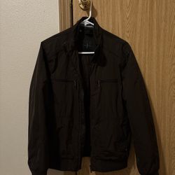 Brown bomber jacket with zipper pockets 