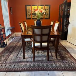 Formal dining table with six chairs
