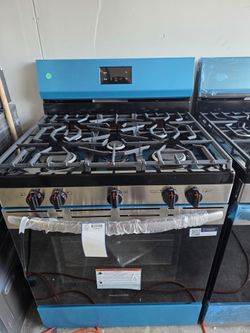 STOVE FRIGIDAIRE  5 BURNERS  STAINLESS STEEL  BRAND NEW