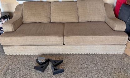 Tan Fabric Three-Seat Sofa with Nailhead Trim