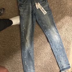 2 pairs of purple jeans 