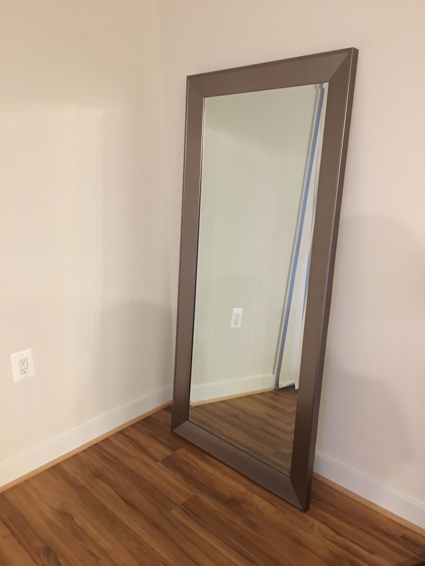 Leaning Silver Mirror