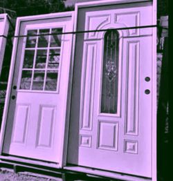 Two White Exterior Entry Doors with Glass