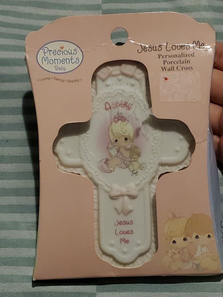 Precious moments cross with name Ashley on it