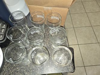 9 Vasos Cocacola $25