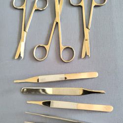 A Set of 7 Pc. Stainless Steel Suture Scissors and Dressing Tweezers