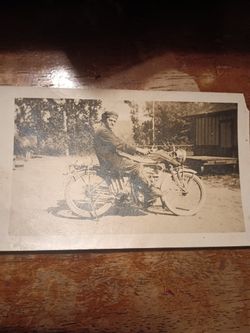 1900"S Photo Of A Man On An Indian Motorcycle For Sale.