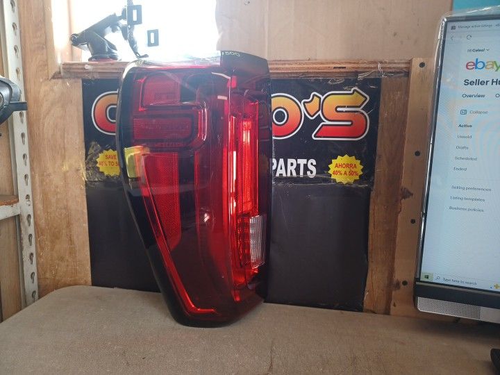 19 25 GMC Sierra 1500 LH Tail Light LED OEM. 