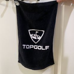Black Topgolf Sports Towel with White Screen Print for Golfers has silver piece to hook to your golf clubs. Great to attach to a bag