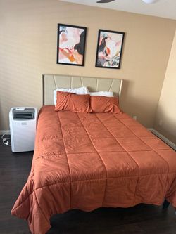 Queen bed w/ mattress and sheets