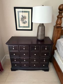 Pair of lateral files used as nightstands.