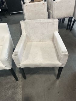Fuzzy padded chairs, with covers