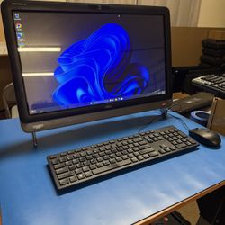 Touchscreen Dell All-In-One (Computer and Monitor built in) with Keyboard, Mouse, and Power Cable.
