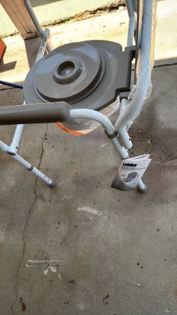 Brand new bedside commode