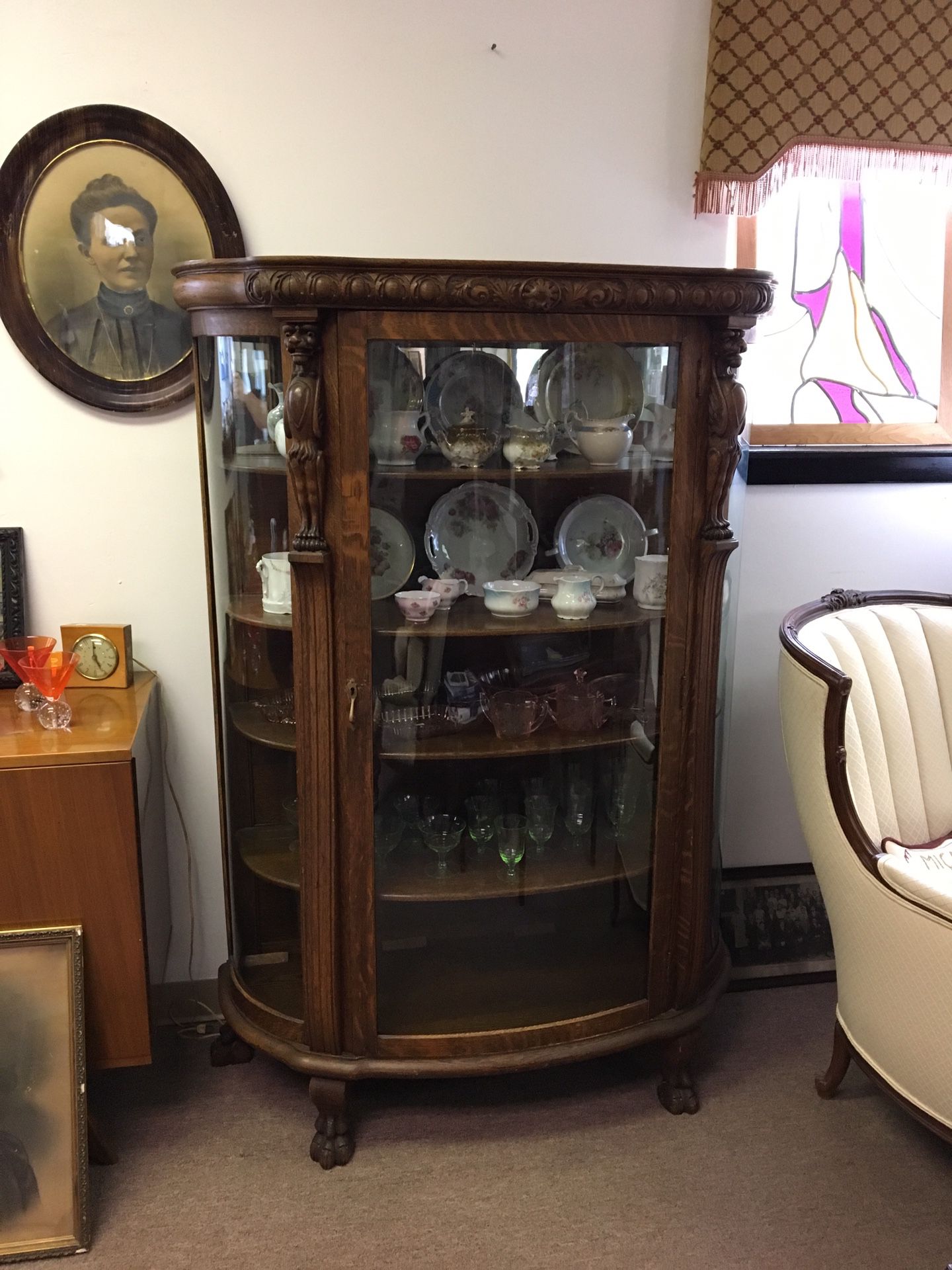 Antique oak curio cabinet, early 1900s, 4 shelves, curved glass