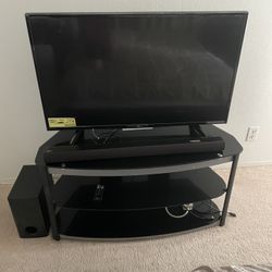 LG TV 44, Sound Bar, Subwoofer and TV Stand