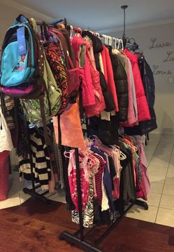 4 racks of girls clothing. Sizes 6x- 14.