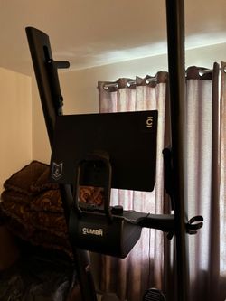CLMBR Connected vertical climbing machine designed for at-home full-body cardio and strength training.