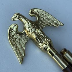 Wood flag pole with metal bald eagle topper