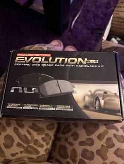 Evolution Plus Brake Set (Ceramic Disc Brake Pads with Hardware Kit & Geniune Geomet Coated Rotors)
